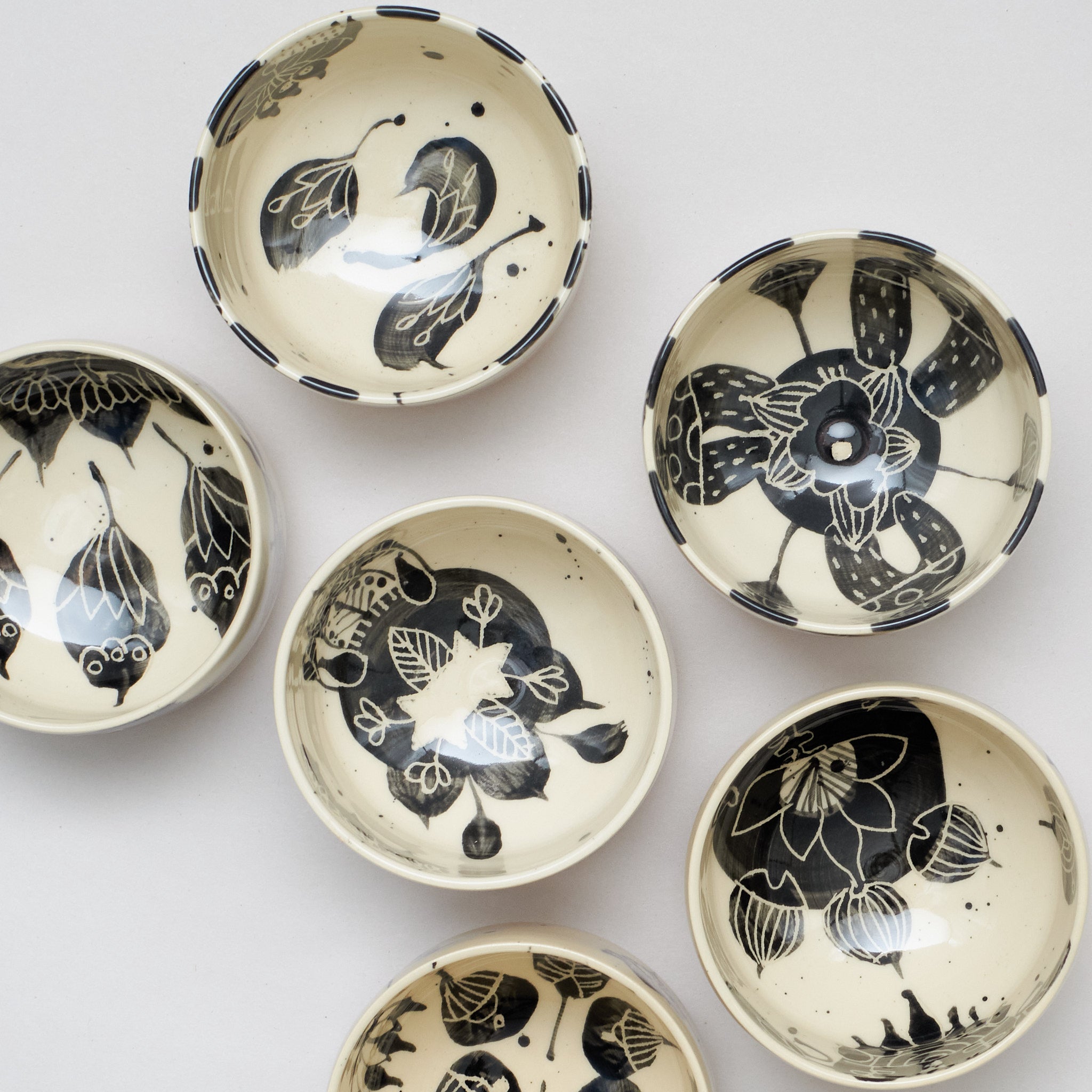 Black and white earthenware bowls by Marie Serreau