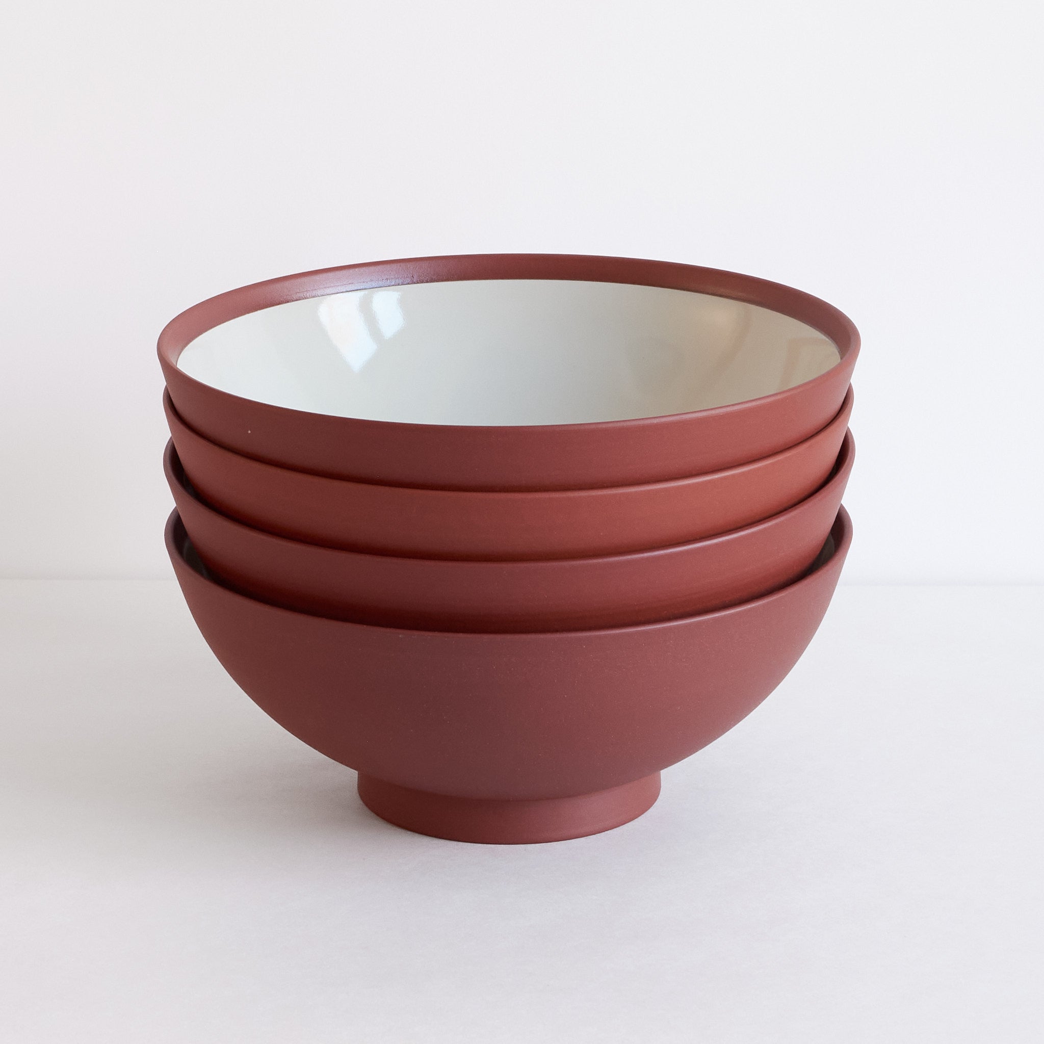 Stack of large stoneware pho bowls by Lea & Nicolas