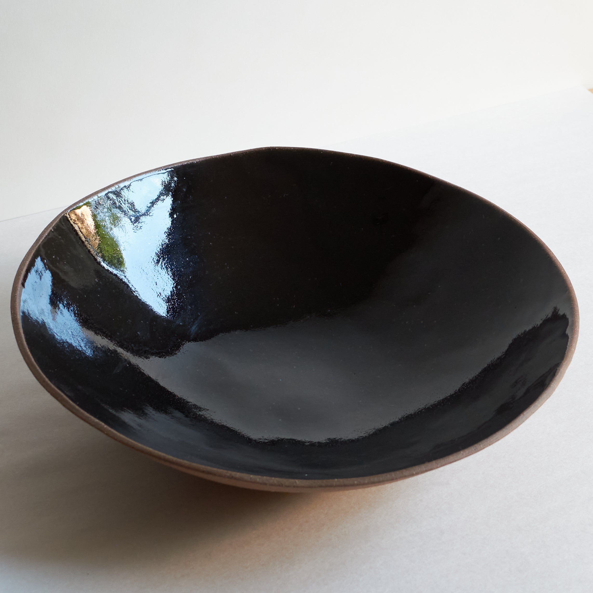 Black ceramic fruit bowl