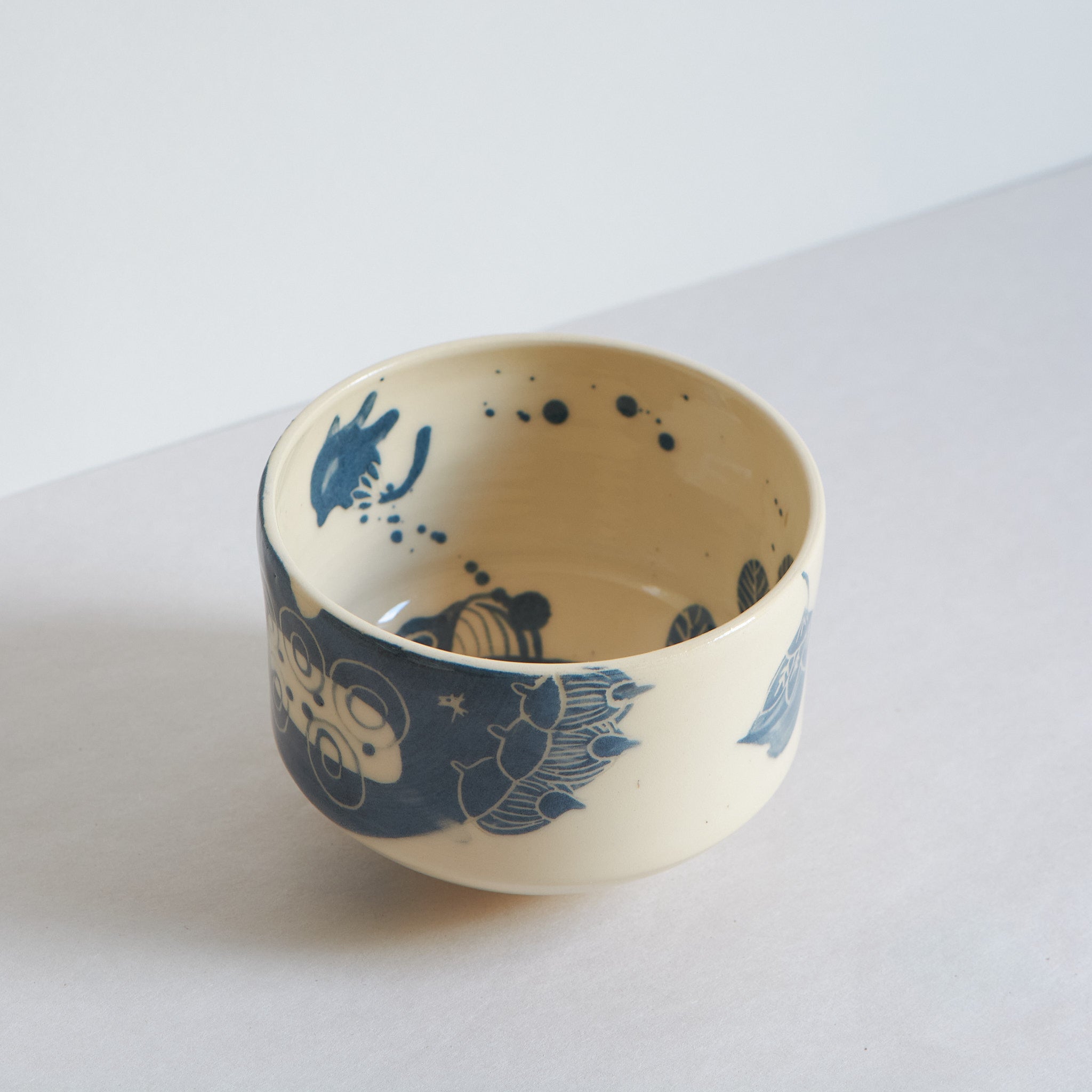 Blue and white earthenware bowl by Marie Serreau