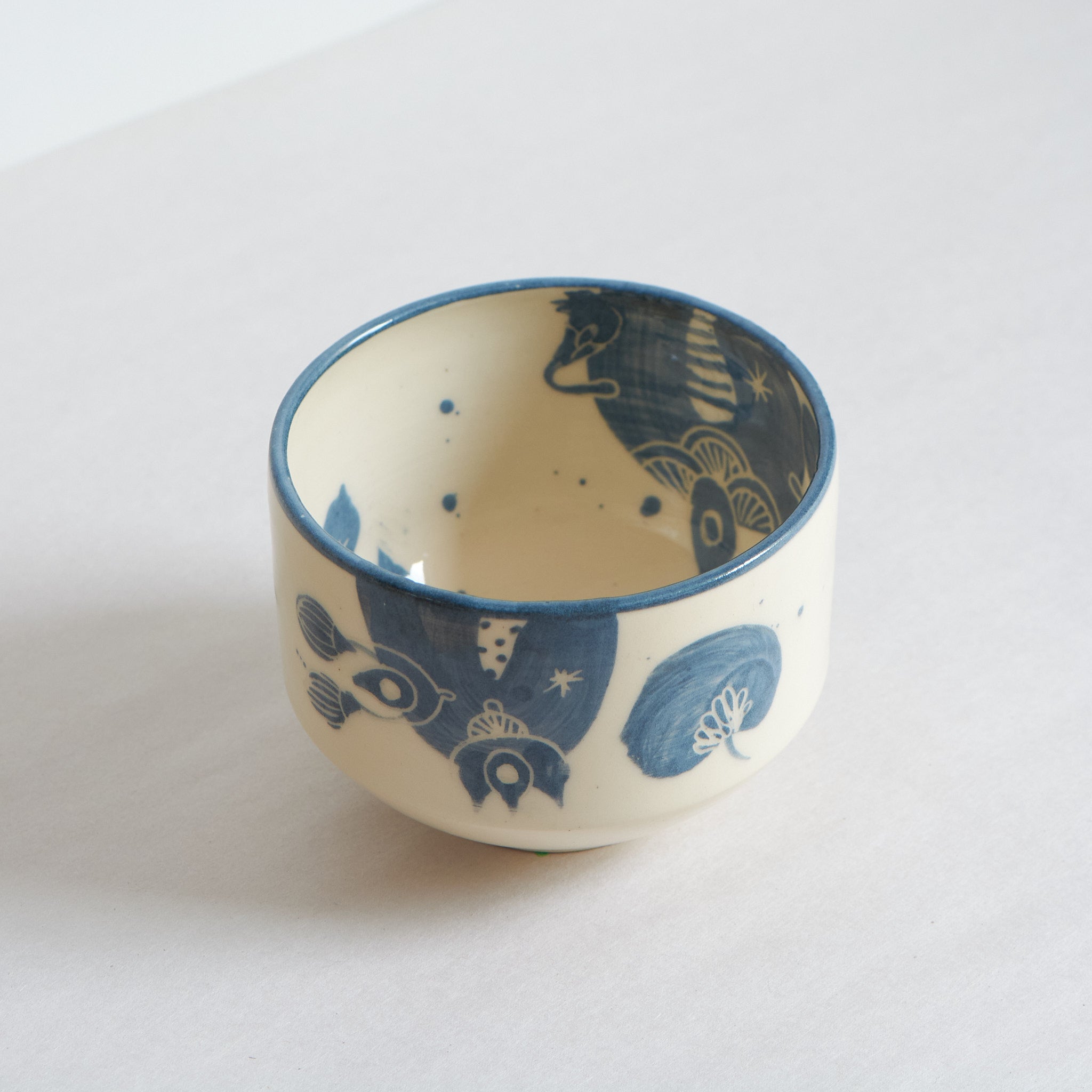 Blue and white earthenware bowl by Marie Serreau