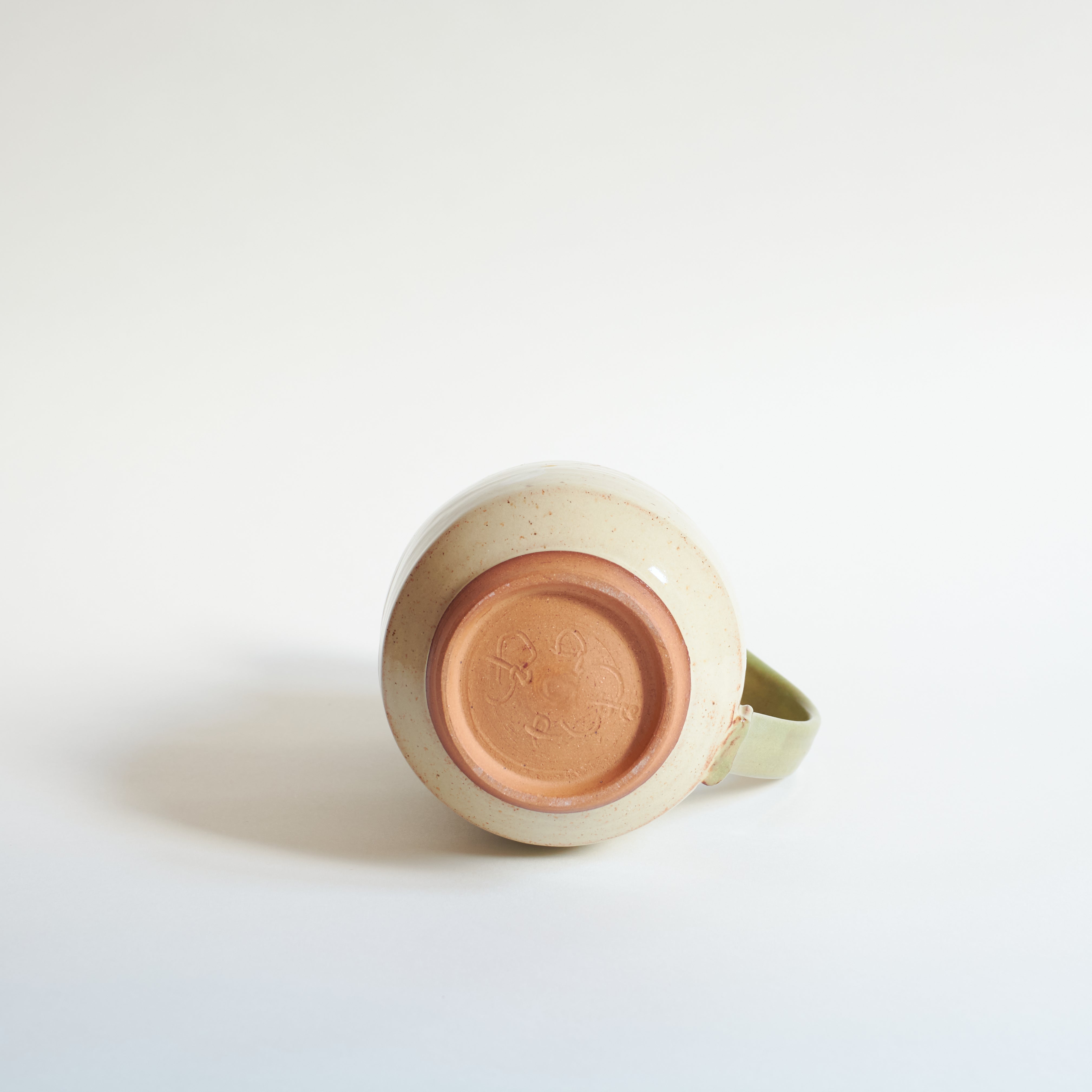 Base view of spring cherry blossom small pitcher.