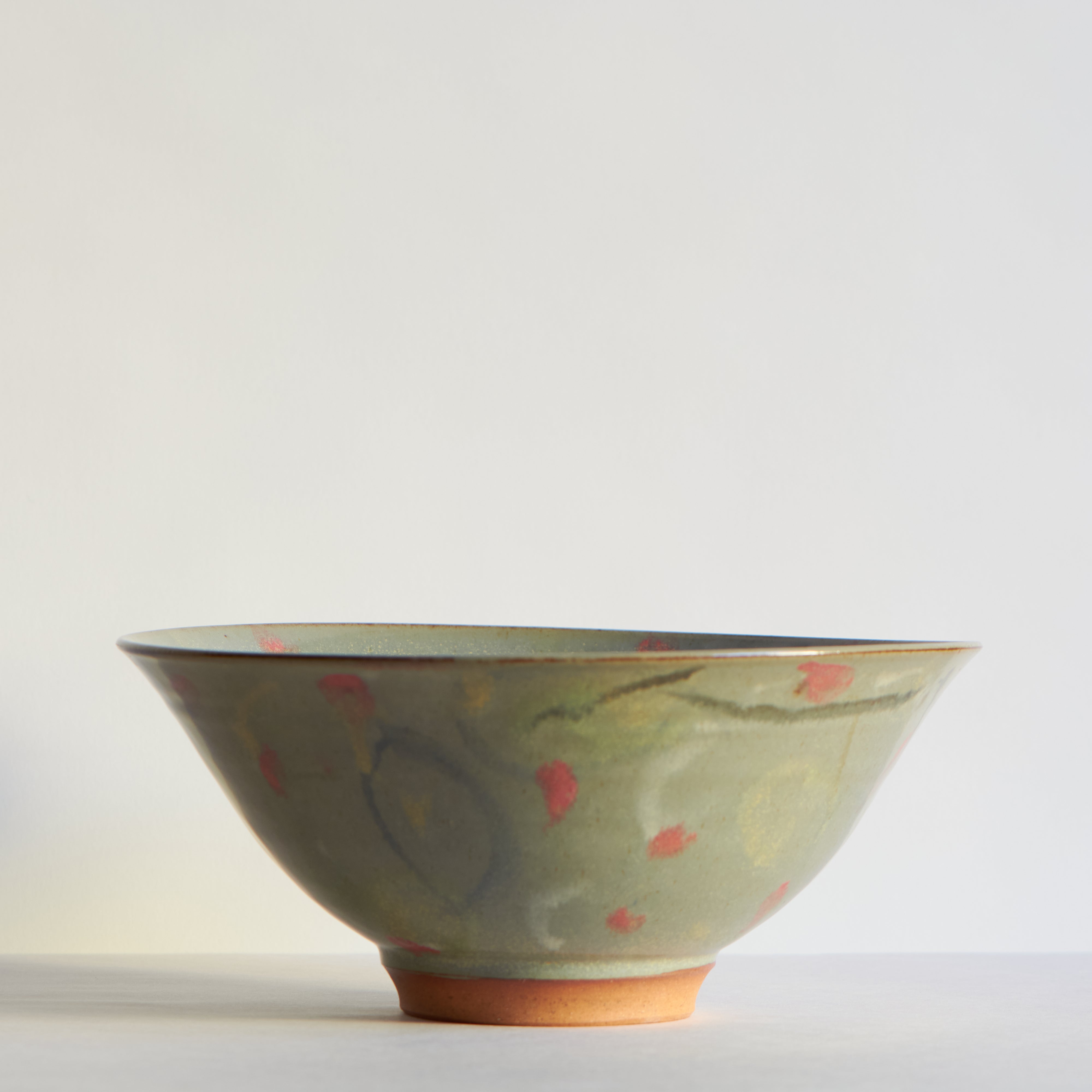 Ceramic bowl with floral patterns on a light background