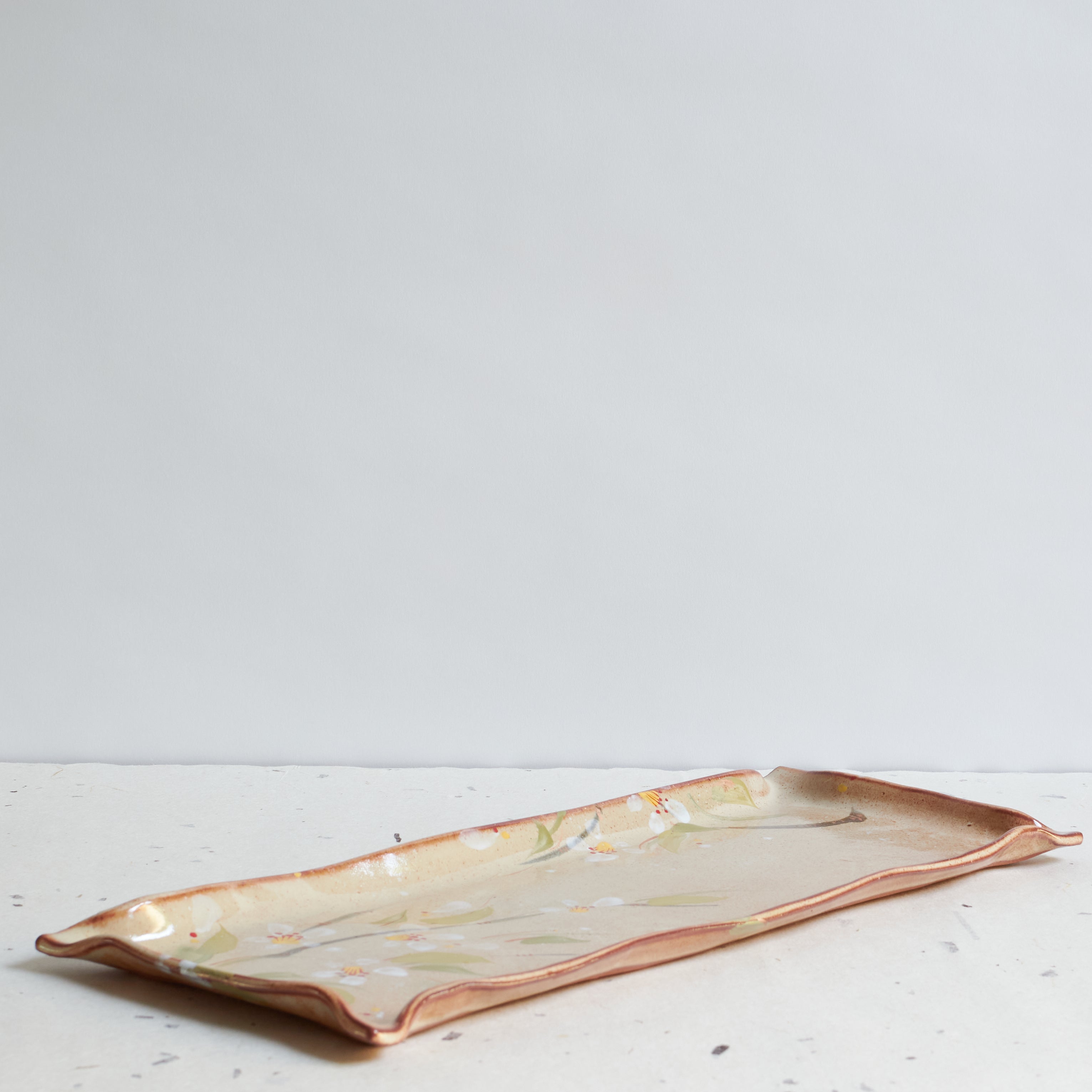 Rectangular ceramic plate with cherry blossom design