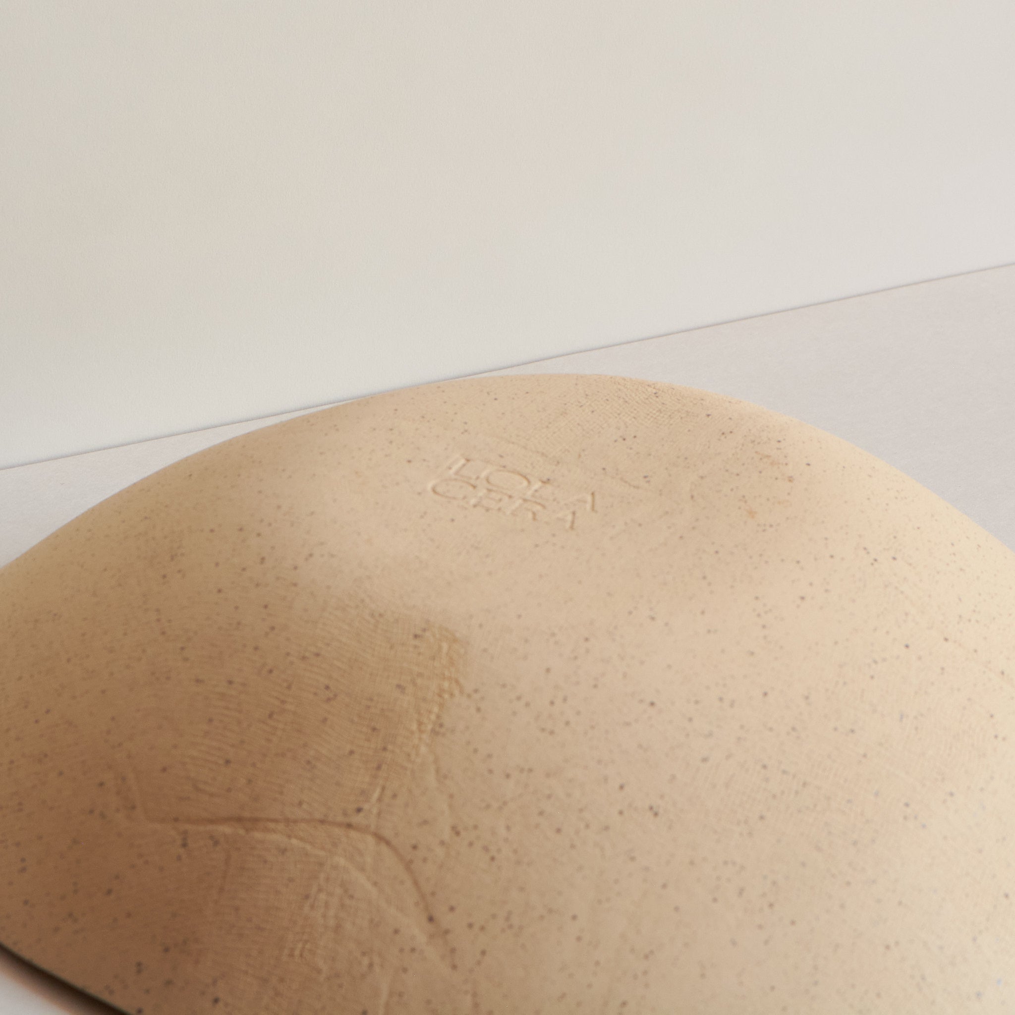 Bottom view of a ceramic fruit bowl