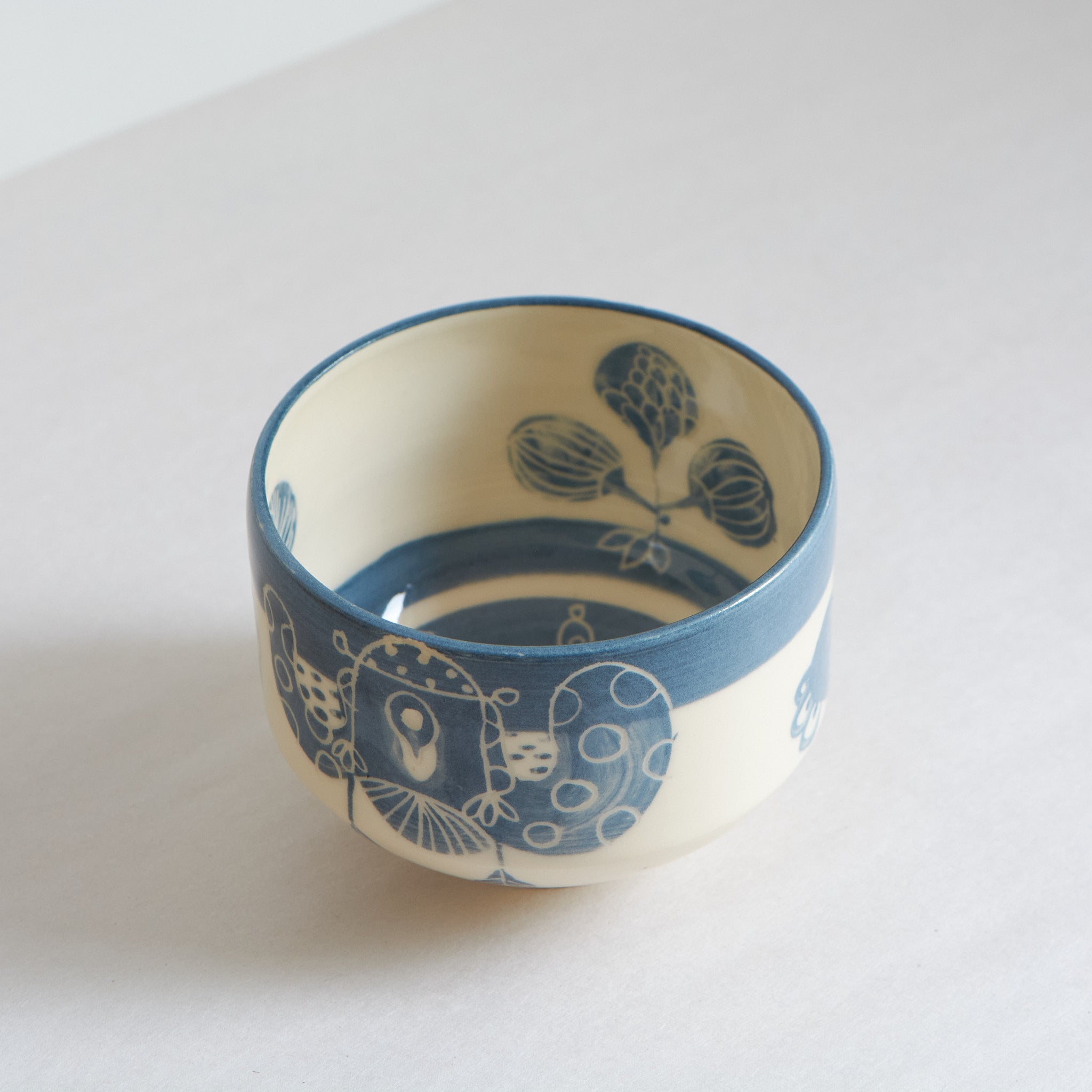 Blue and white earthenware bowl by Marie Serreau