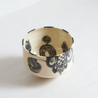 Black and white earthenware bowl by Marie Serreau
