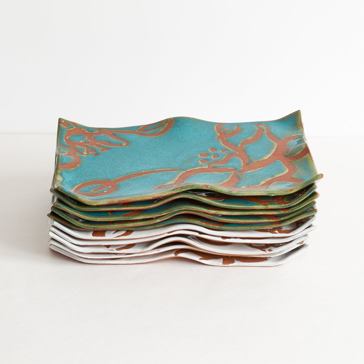 Set of authentic Japanese ceramic sushi plate in white and emerald green.